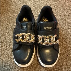 New Justice Black Sneakers with Gold Chain Accent